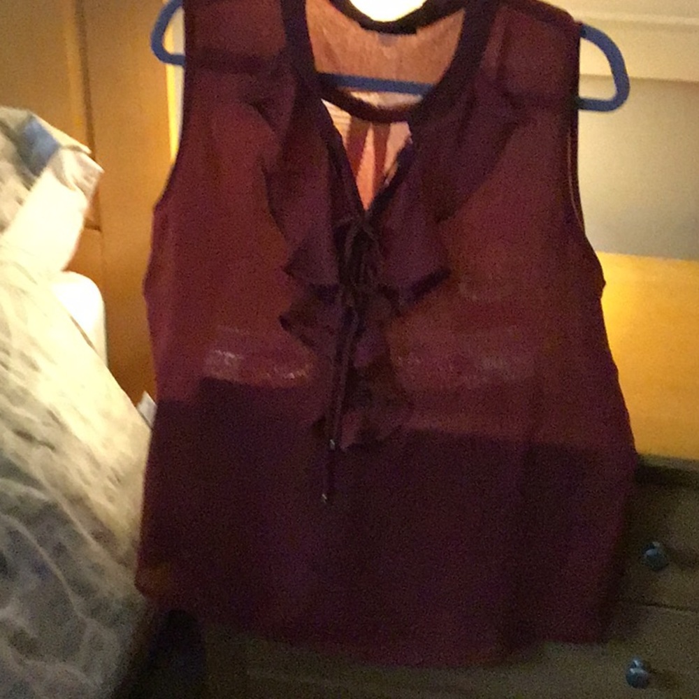 Tommy Hilfiger ruffle sleeveless blouse.